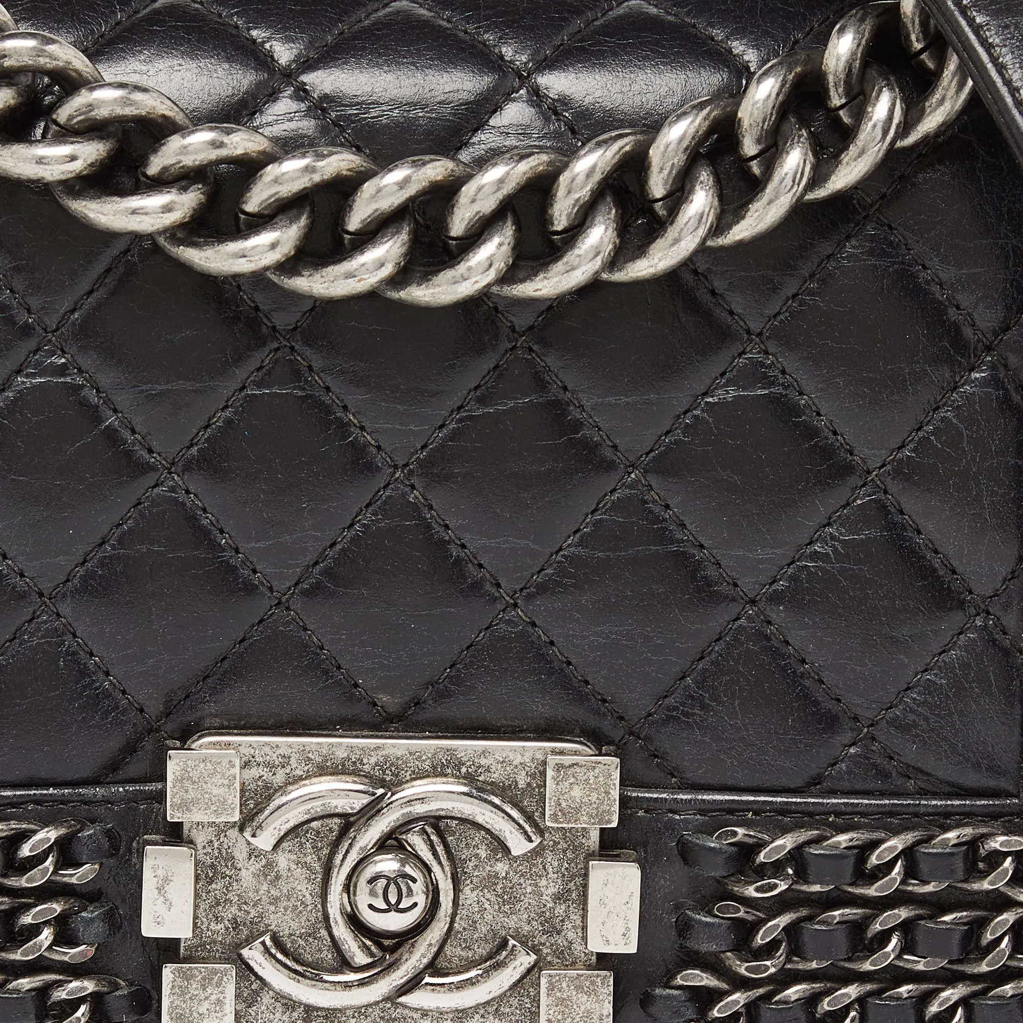 CHANEL Black Quilted Leather Small Boy Chained Flap Bag
