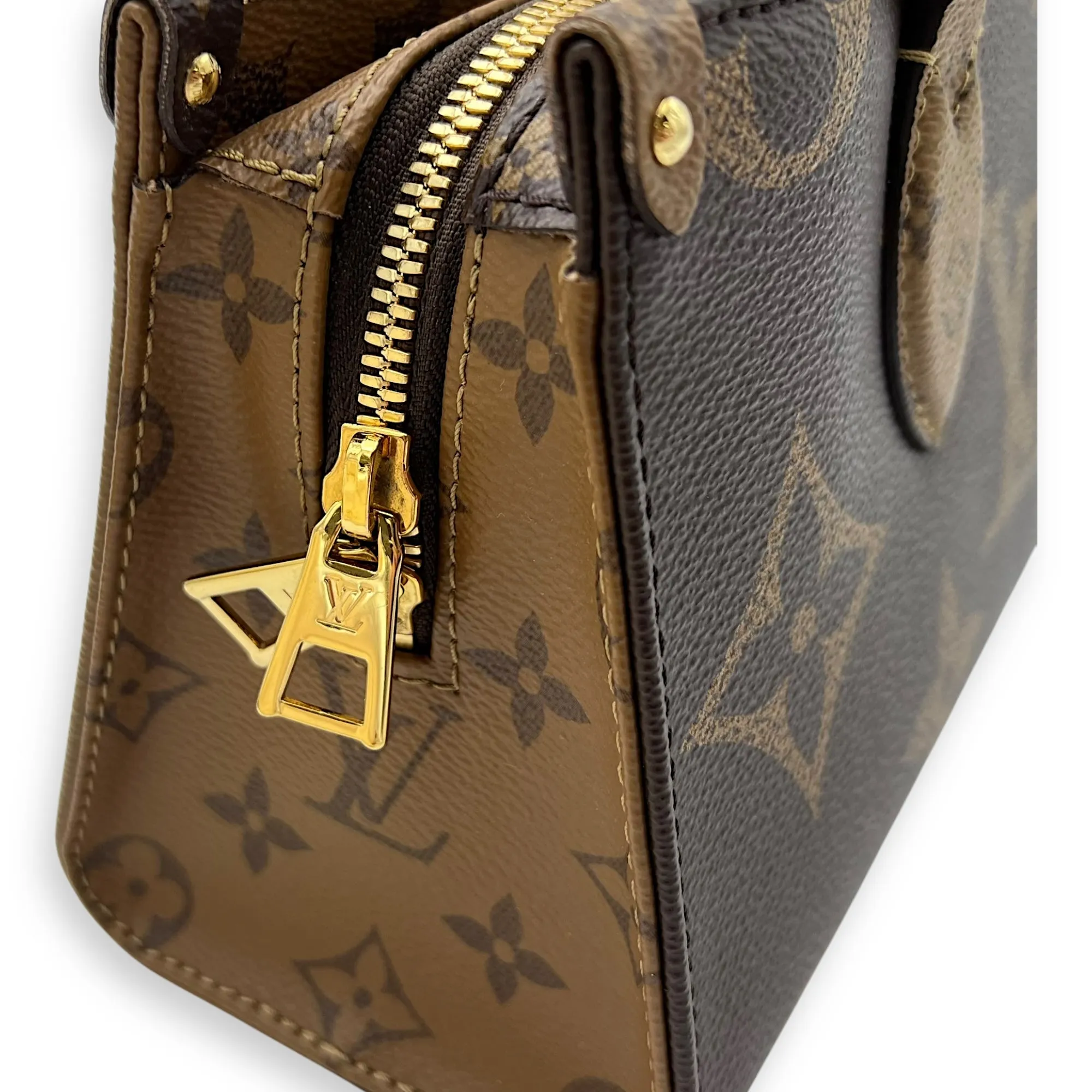 OnTheGo Tote Bag East West Brown in Monogram Coated Canvas, Gold hardware