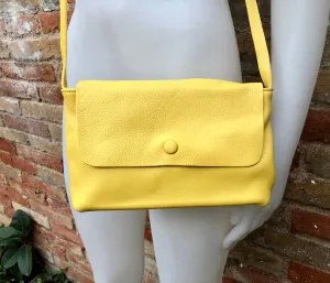 Small leather bag in yellow. Cross body or shoulder bag in GENUINE leather. Yellow leather bag with adjustable strap,  zipper and flap.