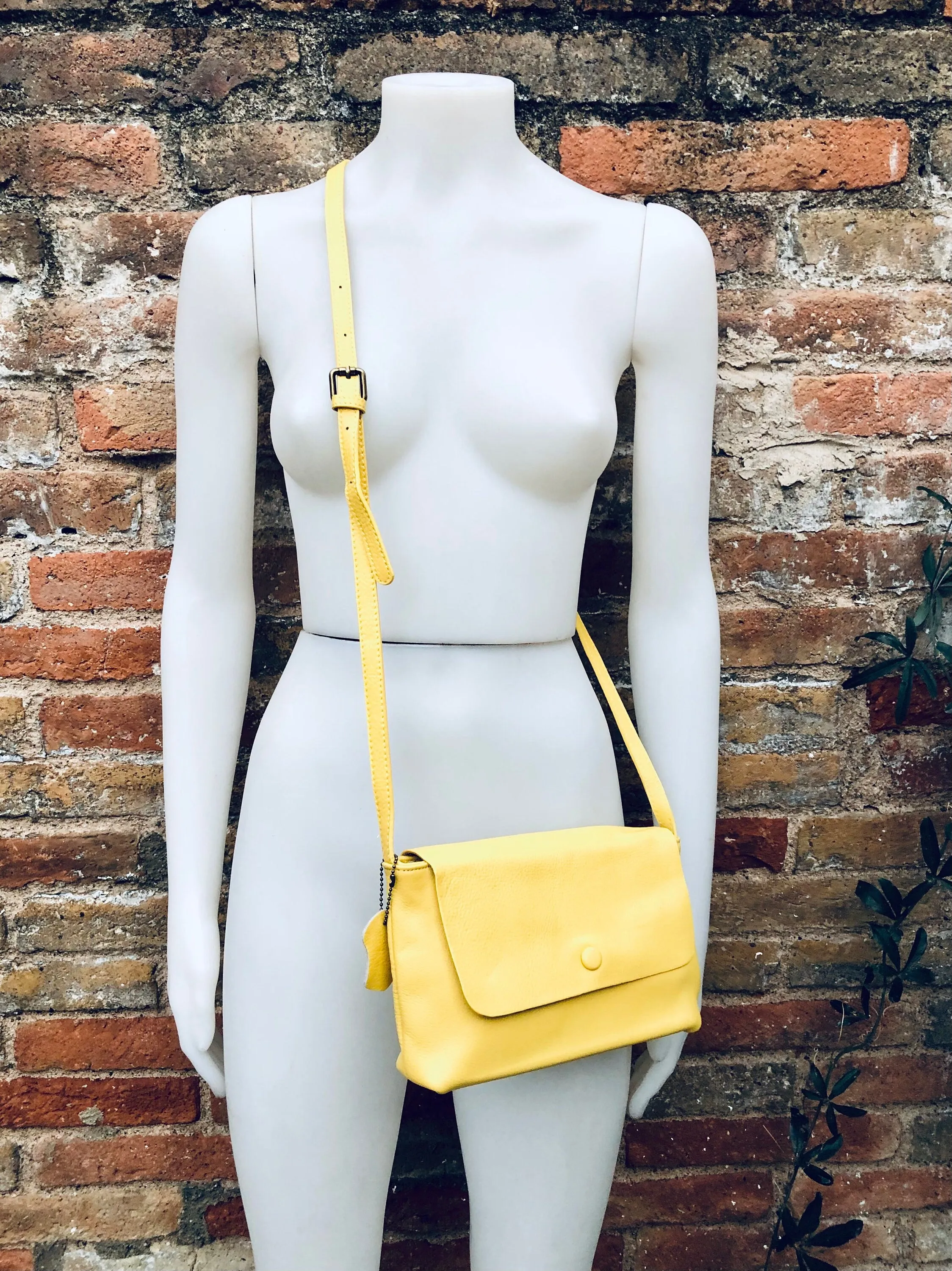 Small leather bag in yellow. Cross body or shoulder bag in GENUINE leather. Yellow leather bag with adjustable strap,  zipper and flap.