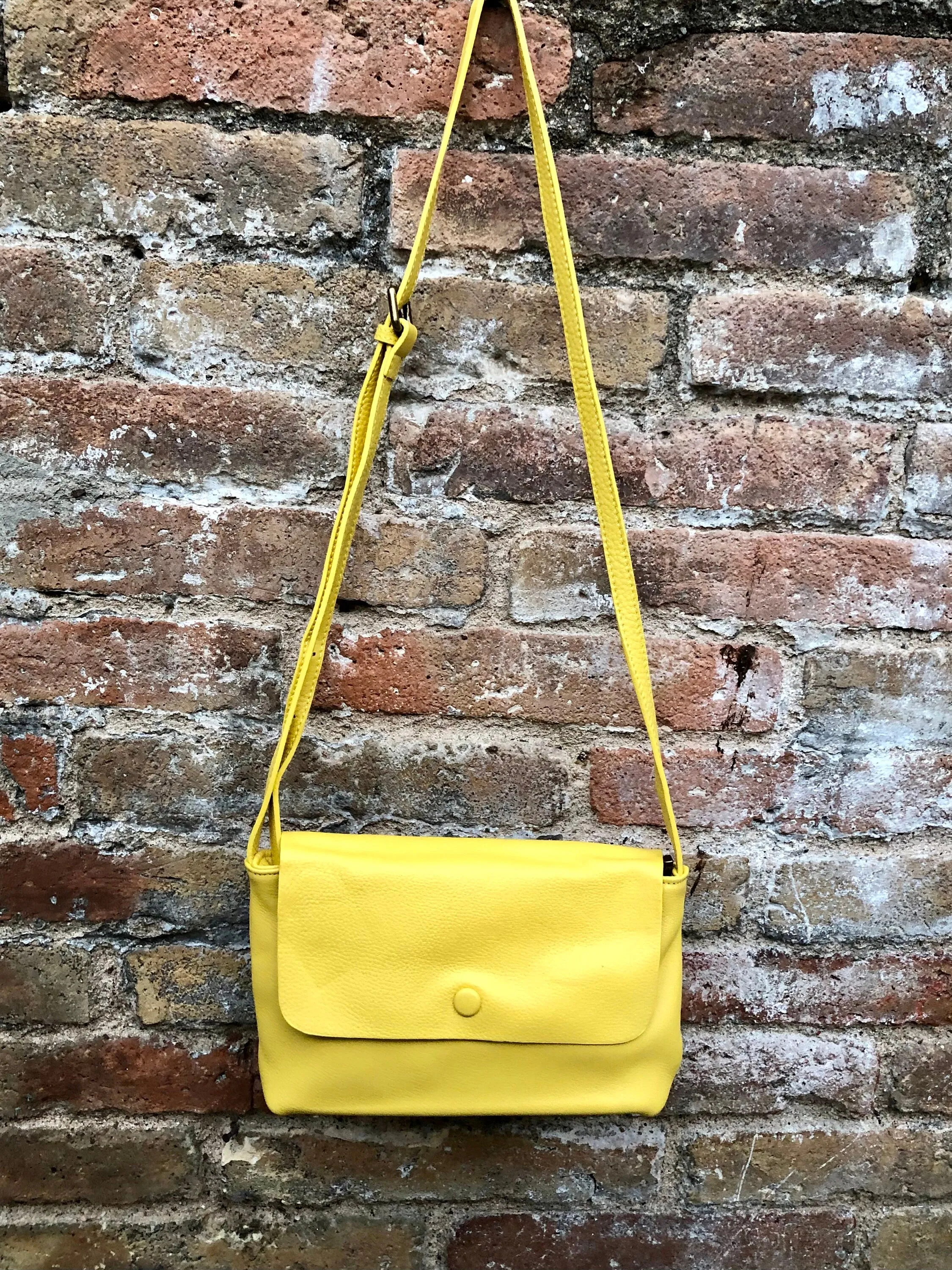 Small leather bag in yellow. Cross body or shoulder bag in GENUINE leather. Yellow leather bag with adjustable strap,  zipper and flap.
