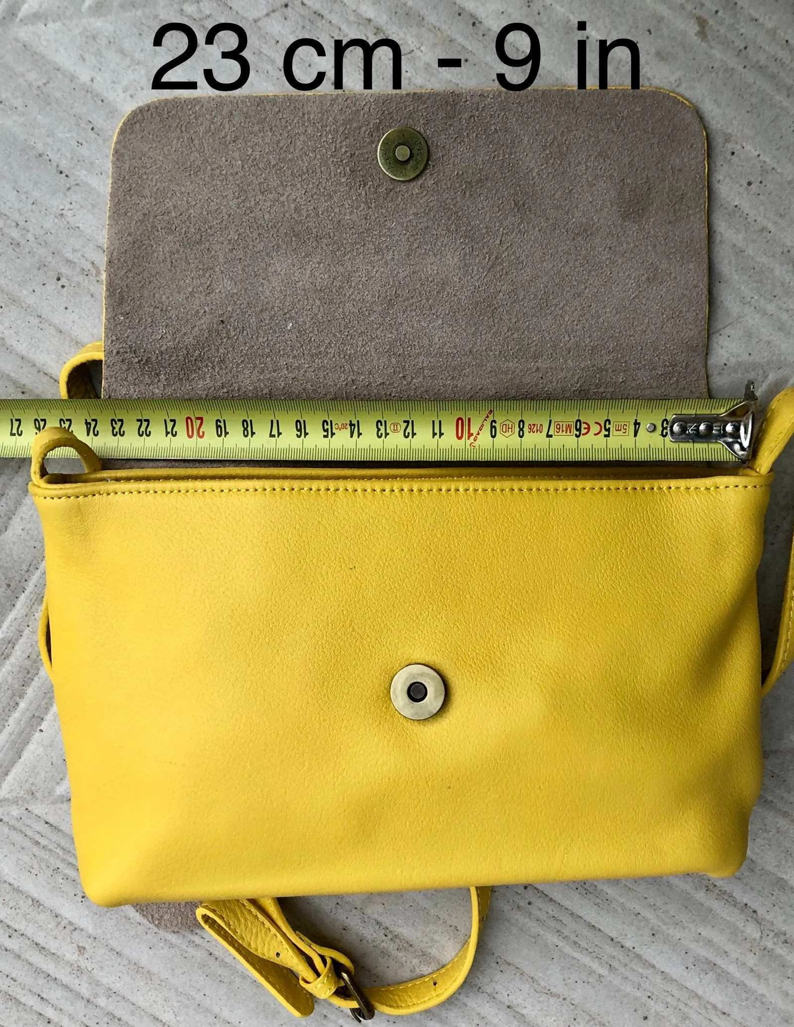 Small leather bag in yellow. Cross body or shoulder bag in GENUINE leather. Yellow leather bag with adjustable strap,  zipper and flap.