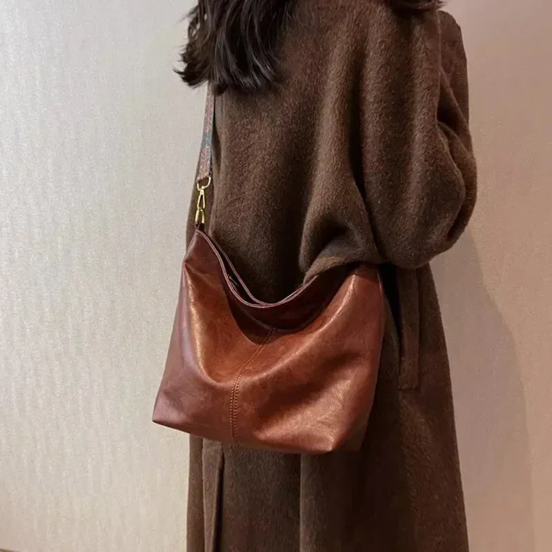 Spring Bag Ideas: Classic Leather Crossbody Bag with Fashion Wide Strap