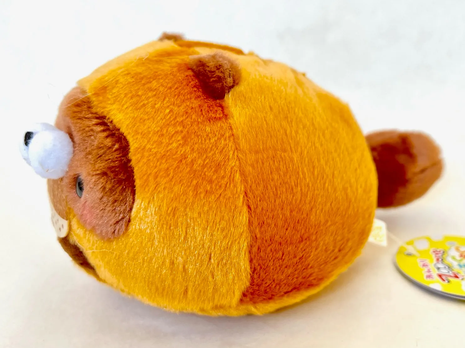 X 63203 ROUND ANIMAL PLUSH-DISCONTINUED