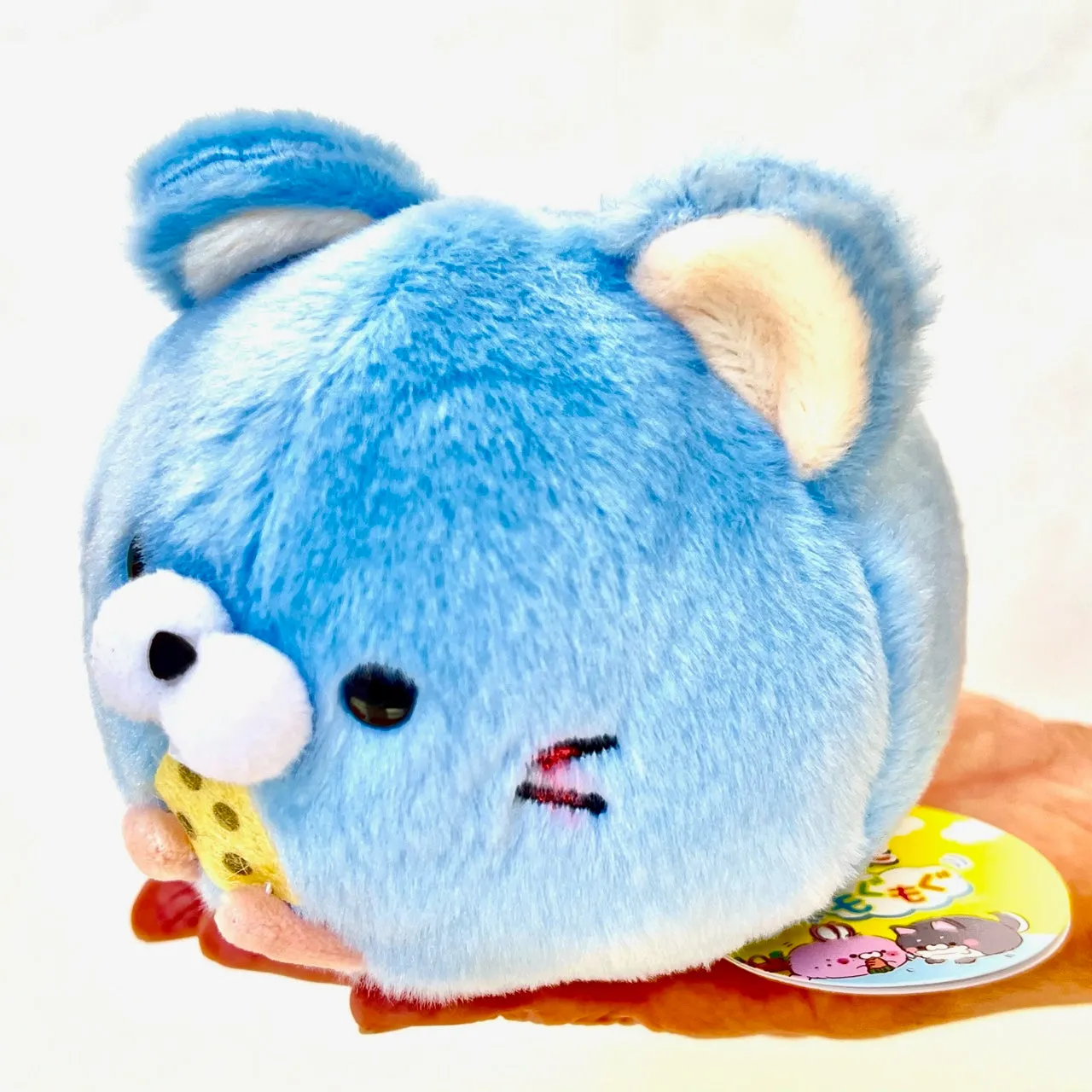X 63203 ROUND ANIMAL PLUSH-DISCONTINUED