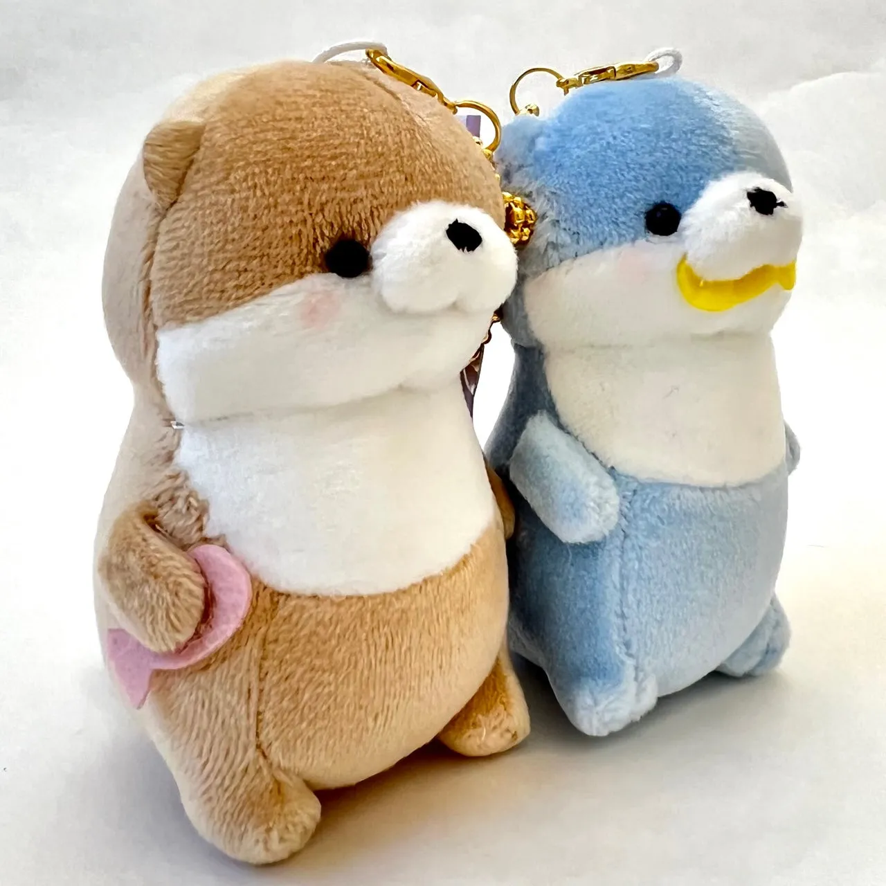 X 63315 CRUX OTTER BUDDIES PLUSH CHARMS-DISCONTINUED